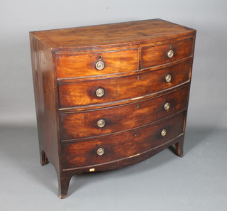 A George III mahogany bow front chest, crossbanded and ebony line inlaid, fitted 2 short and 3 graduated long drawers on splayed  feet