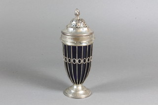 An Edwardian silver sugar sifter with glass liner Chester 1906 raised on a circular spreading foot 5 ozs