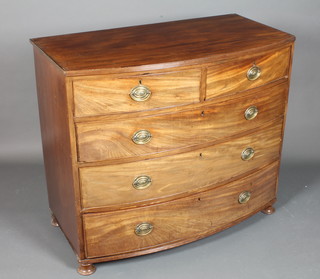A George III mahogany bow front chest fitted 2 short and 3  graduated long drawers, raised on later turned feet 37"h x 43"w x  23"d