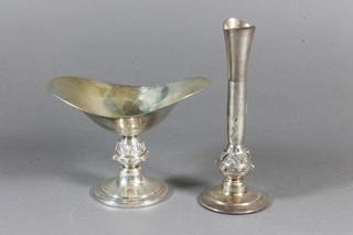 A silver boat shaped dish with Celtic design to the base, London, together with a similar vase, 7 ozs