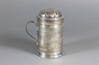 A cylindrical silver sifter "mug" with strap work handle, Chester 1904, 8 ozs