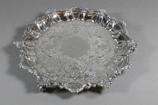 An Edwardian engraved silver salver with bracketed border, raised on 3 scroll feet, London 1905 by Searle & Co, 14 ozs