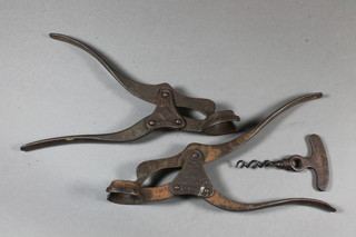 A Lunds patent corkscrew and a lever action corkscrew