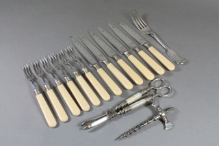 A set of 6 silver plated fruit knives and forks, a silver plated champagne spicket and a pair of grape scissors