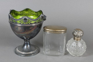 A globular cut glass dressing table bottle with silver lid 3", an oval cut glass pin jar with silver lid 3.5" and a silver plated  basket with green glass liner and swing handle