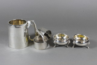 A silver christening tankard, Chester marks rubbed, a pair of Victorian circular silver salts London 1891, 2 silver napkin rings,  7 ozs