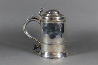 A George II silver lidded tankard with parcel gilt interior London  1742 by William Williams I, 25ozs  ILLUSTRATED