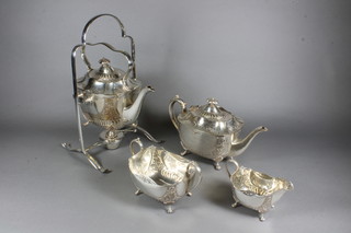 A silver plated 4 piece tea service of oval embossed form comprising tea kettle, stand and burner, teapot, sugar bowl and  twin handled cream jug