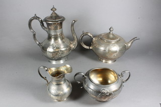 A 4 piece Britannia metal tea/coffee service with teapot, coffee pot, sugar bowl and cream jug