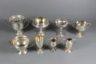 7 various silver trophy cups 13 ozs and 1 other