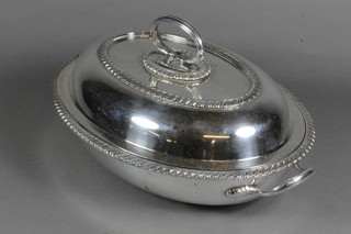 An oval silver plated entree dish and cover complete with liner  by Mappin & Webb