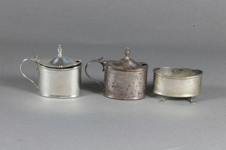 An oval 3 piece silver condiment set - pair of mustard pots and  oval salt Birmingham 1919, liner to salt missing, 3 ozs,