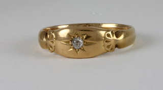 An Edwardian 18ct gold dress ring set a diamond