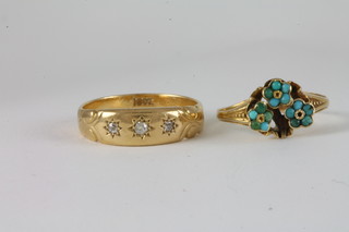 An 18ct gold gypsy ring set 3 diamonds and an 18ct gold ring set turquoise