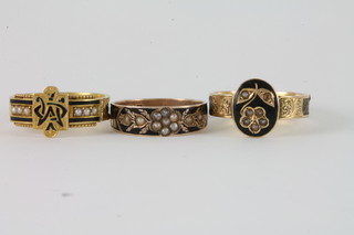 2 15ct gold black enamelled mourning rings and a 9ct gold  mourning ring