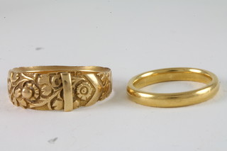 A 22ct gold wedding band 3.7 grams and 18ct gold buckle ring  4.5 grams
