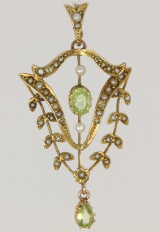 A 15ct gold pendant set peridot and pearls   ILLUSTRATED