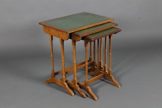 A nest of 3 rectangular mahogany Regency style interfitting  tables with green leather inset surfaces, raised on turned supports  21"h x 20"w x 14"d