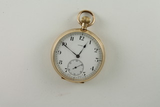An open faced pocket watch contained in a 14ct gold case
