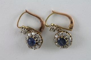 A pair of sapphire and diamond drop earrings