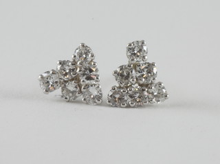 A pair of lady's 18ct white gold triangular shaped ear studs set diamonds