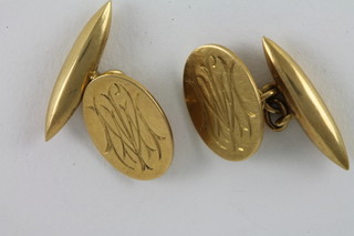 A pair of 18ct gold cufflinks 8.8 grams and 2 gold collar studs