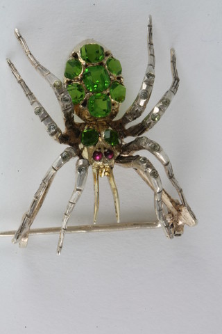 A silver and paste set brooch in the form of an insect