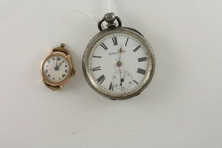 A keywind open faced pocket watch contained in a silver case  and a lady's gold cased wristwatch