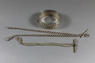A silver bangle and 2 Albert watch chains