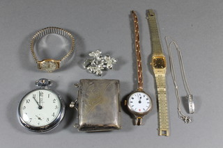 A silver plated purse, wristwatches etc