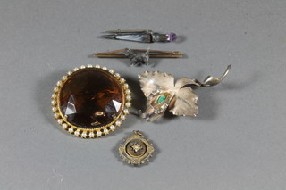 A bar brooch in the form of a Scottie dog, a brooch in the form  of a dagger and a small collection of costume jewellery
