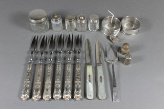 2 silver napkin rings, 2 folding silver fruit knives with mother of pearl grips, a silver pastry forks, 6 silver handled pastry forks, a  silver thimble, pair of cufflinks etc