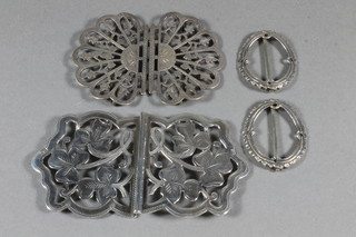 A pair of Georgian silver shoe buckles marked TB Prat & Arthur Humphries, an Edwardian pierced silver nurses buckle  Birmingham 1906 and 1 other pierced silver nurses buckle  Birmingham 1904, 2 ozs