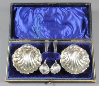 A pair of Victorian silver scallop shaped salts Chester 1893, cased, maker Cornelius Desormeaux Saunders & James   ILLUSTRATED