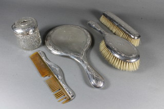 A 4 piece silver backed dressing table set and a circular hobnail  cut hair tidy with silver mount, Birmingham 1910