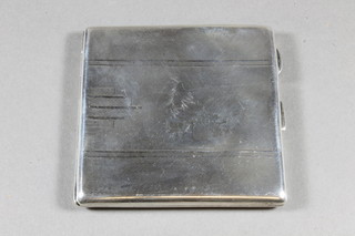 A silver cigarette case with engine turned decoration Birmingham 1931 3 ozs