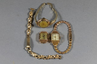 A lady's Ancre wristwatch in an 18ct gold case, 1 other in a 14ct  gold case, a gold cased wristwatch and a strap