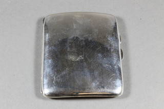 A plain silver cigarette case Birmingham 1928 2 ozs