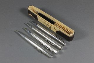 A Parker propelling pencil, a silver cased propelling pencil, 2 Sterling silver life long propelling pencils and a chromium cased propelling pencil