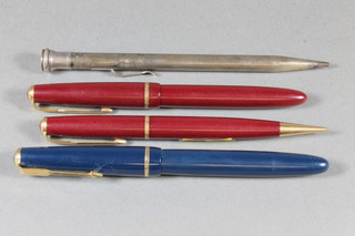 A blue Parker fountain pen the nib marked Parker 14k 585, a red Parker Slimfold fountain pen, a red Parker propelling pencil, a  Continental silver propelling pencil