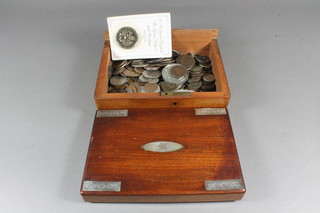 A 19th Century mahogany box containing a collection of coins