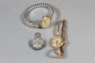 2 lady's gold cased wristwatches and a silver Army Service Corps shooting medal