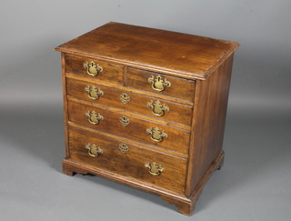 A George III style oak chest of 2 short and 3 long drawers with  brass swan neck drop handles, raised on bracket feet 26"h x  28"w x 19"d