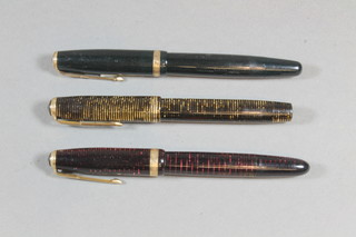 A Parker Vacumatic no.52 fountain pen, a parker Vacumatic  fountain pen, a Parker Duofold fountain pen contained in a black  case