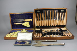 A canteen of chromium plated cutlery, a canteen of 6 silver plated fish knives and forks complete with servers, a pair of  silver plated jam spoons, cased and a a pair of silver plated fish  servers