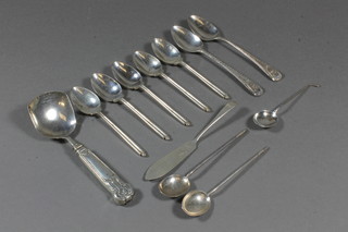 3 Georgian bright cut teaspoons, 5 silver spoons decorated golf balls, 2 silver coffee spoons and a silver butter knife 3 ozs,  together with a Georgian silver serving spoon