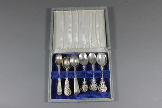 A collection of 23 various Eastern white metal teaspoons