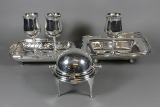 A silver plated roll top butter dish, 2 cake baskets with swing handles and 3 silver plated goblets