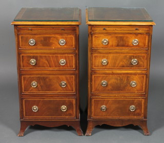 A pair of Georgian style mahogany pedestal chests with  cross banded tops, fitted a brushing slide above 4 long drawers raised on bracket feet 35"h x 16"w x 40"d