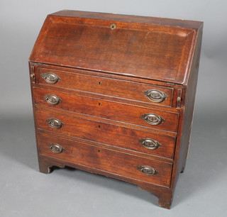 A George III oak bureau, the fall front enclosing a fitted interior  above 4 long drawers, raised on bracket feet 40"h x 36"w x 17"d
